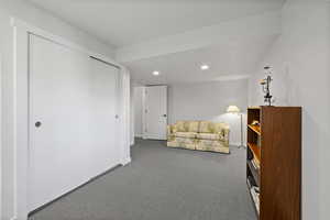 Sitting room featuring carpet and recessed lighting