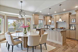 Dining room featuring light wood-type flooring and recessed lighting