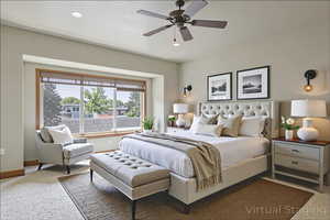 Bedroom featuring carpet, ceiling fan, and recessed lighting