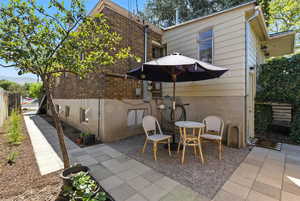 Rear view of house featuring a patio area