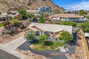 Aerial perspective of suburban area with a mountain backdrop