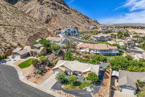 Aerial view of residential area featuring a mountainous background