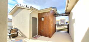View of Casita with Stucco and copper siding