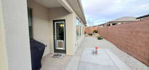 Fenced backyard with a patio area, plumbed for hot tub