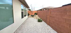 View of fenced backyard