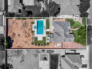 Aerial overview of property's location with a pool area and property boundaries highlighted