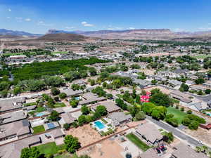 Aerial view of residential area featuring a mountain backdrop