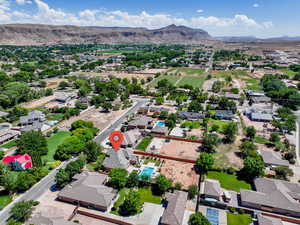 Aerial view of residential area featuring a mountain backdrop