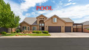 View of front of home featuring stucco siding, driveway, an attached garage, and a tiled roof