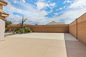 View of patio with basketball hoop