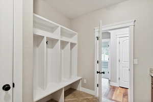 Mudroom featuring baseboards