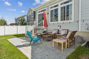 View of patio featuring an outdoor hangout area