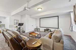 Carpeted cinema with baseboards