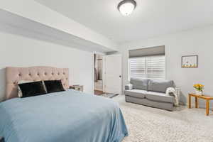 Bedroom featuring carpet
