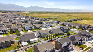 Aerial view of residential area with a mountain backdrop