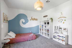 Bedroom with carpet floors