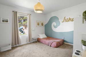 Bedroom with carpet flooring