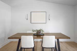 Dining room with light wood-style flooring