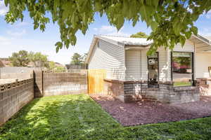 View of home's exterior featuring a fenced backyard