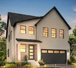 View of front facade with a garage, a shingled roof, and concrete driveway