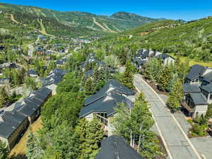 Aerial view of residential area featuring mountains