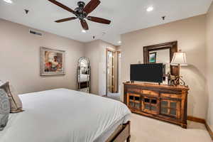 Bedroom with recessed lighting, carpet flooring, and a ceiling fan