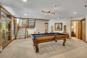 Playroom with carpet flooring, billiards table, recessed lighting, and a baseboard heating unit