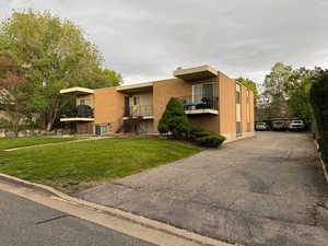 View of property with stairs