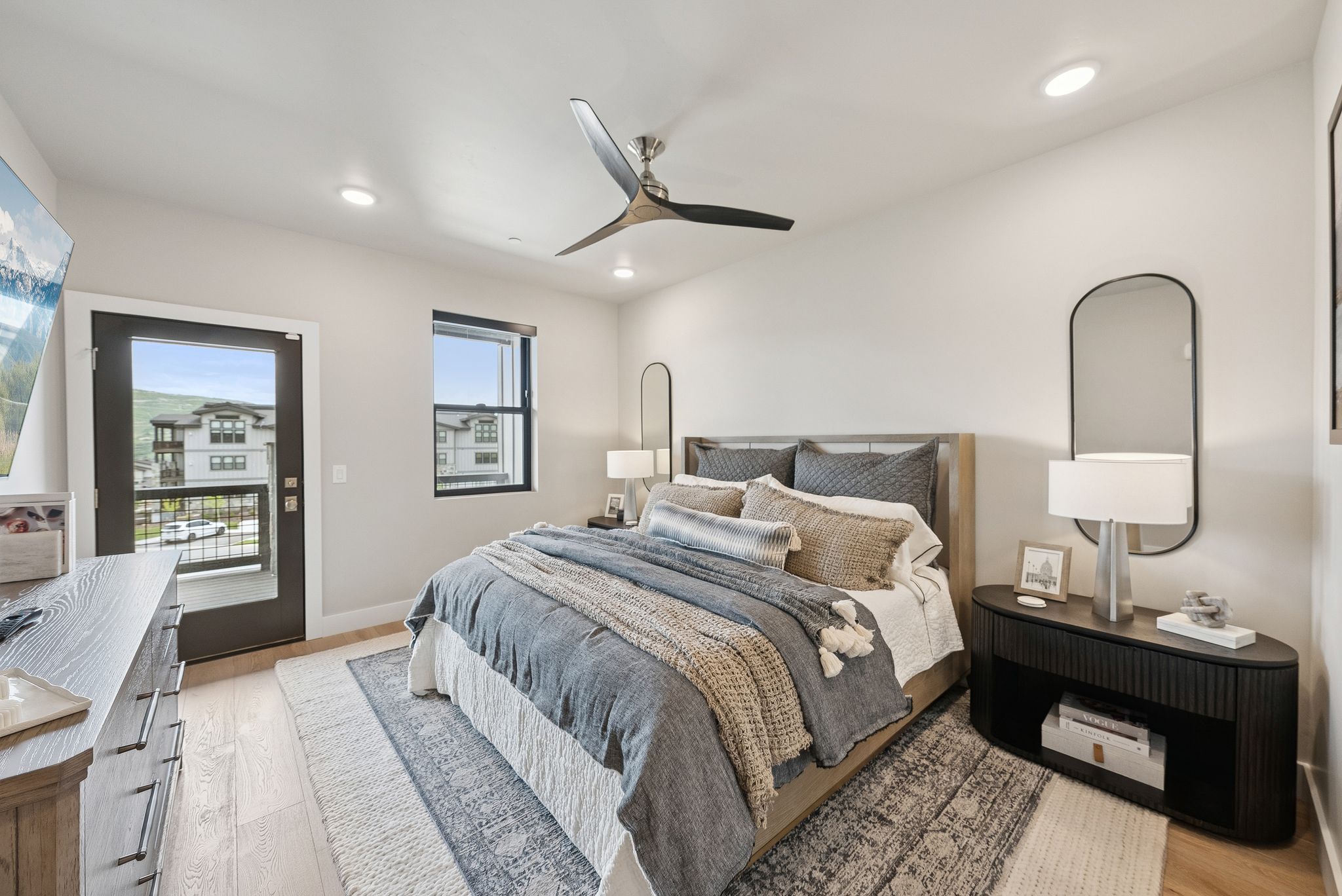 Bedroom featuring light wood-style floors, access to exterior, ceiling fan, and recessed lighting