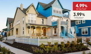 View of front of house with a balcony, stucco siding, a fenced front yard, a chimney, and covered porch