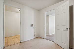 Empty room featuring baseboards