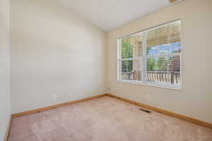 Empty room featuring carpet floors