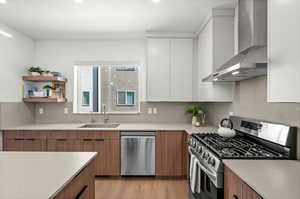 Gas range with vented hood.