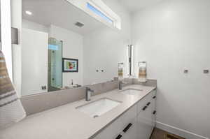 ...and double vanity, with plenty of cabinet space!