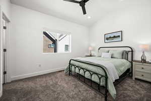 Second primary suite, also with vaulted ceilings.