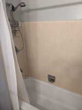 Bathroom featuring shower / tub combo