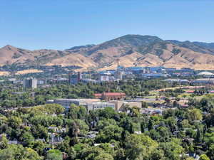 View of mountain background featuring nearby urban area