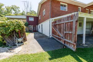 Back of property with brick siding