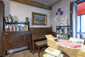 Flexible space with wood finished floors and lighting