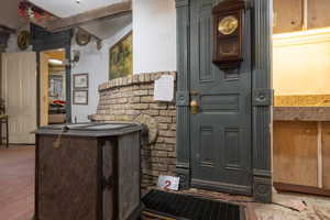 Interior space featuring light wood flooring and gas stovetop
