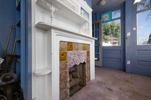 Sunroom with unfinished concrete floors