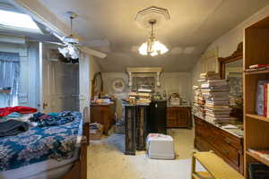 Primary Bedroom with a ceiling fan and sunroof