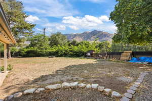 View of yard with a mountain view