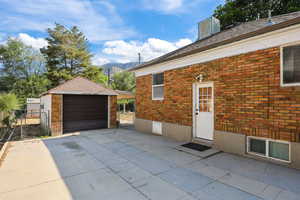 Detached garage with a gate