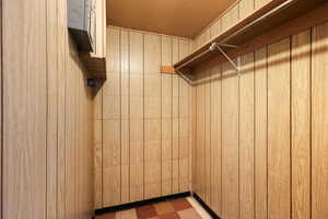 Spacious closet featuring tile patterned floors