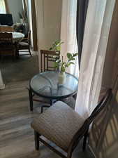 Dining area with wood finished floors