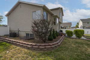 View of home's exterior featuring a central AC unit