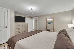 Bedroom with light wood-style flooring