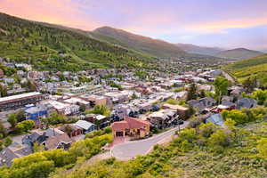 Aerial view at dusk of a mountain view and a residential view