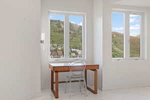 Office area featuring baseboards